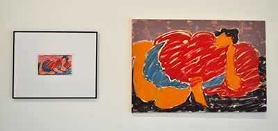 Two pieces, one on left framed and small, one on right much bigger-- both are abstract figures in red