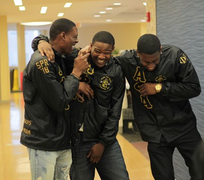 three USI Alpha Phi Alpha members laughing