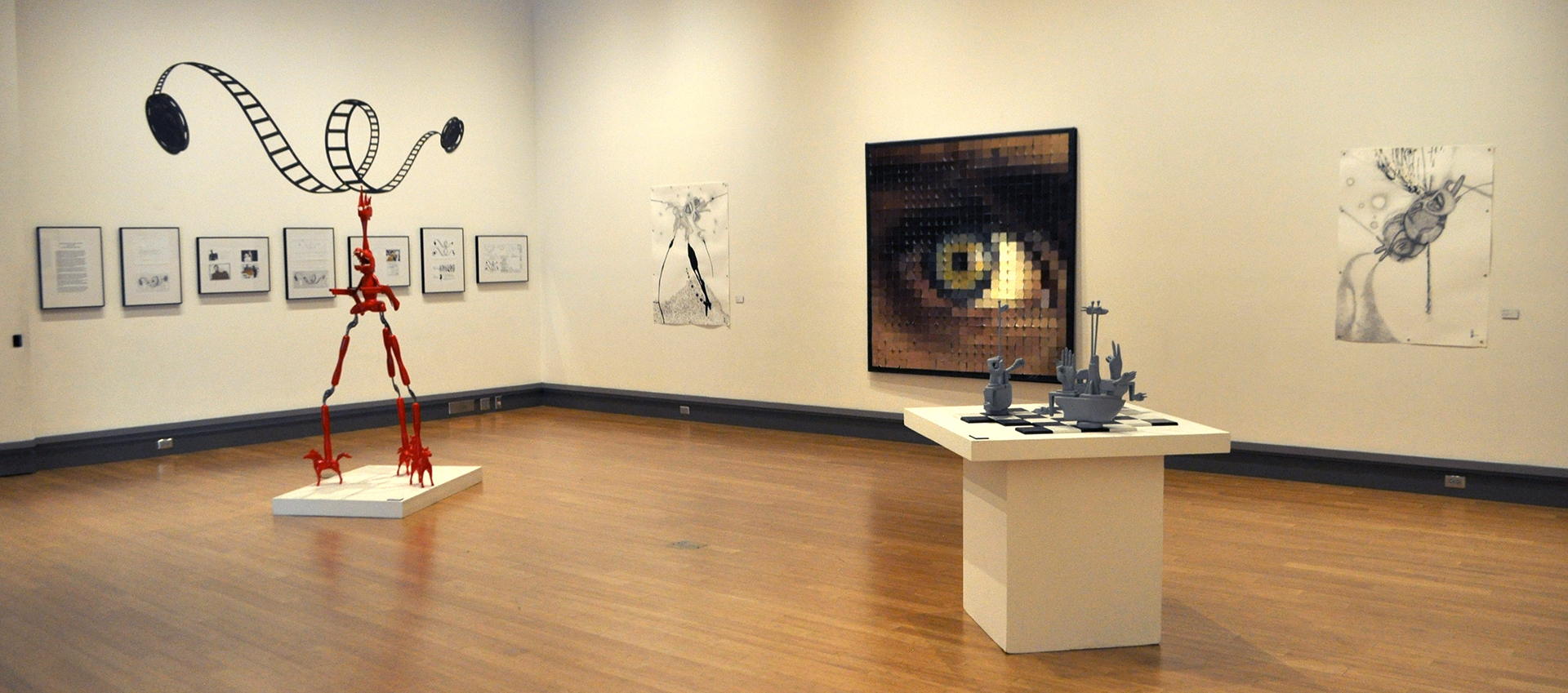 View of McCutchan/Pace gallery, with various art on display: sculpture, 2D