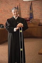 judge wayne trockman standing in court room