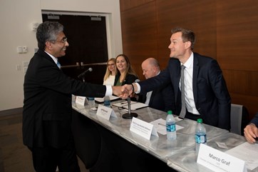 Dr. Mohammed Khayum, USI's provost, shakes hands with Dr. Kay Hendrik Hofmann, professor at Osnabrück University of Applied Sciences during the "Employability: (Made) in Germany discussion panel and networking event held on April 17 in USI's Griffin Center.