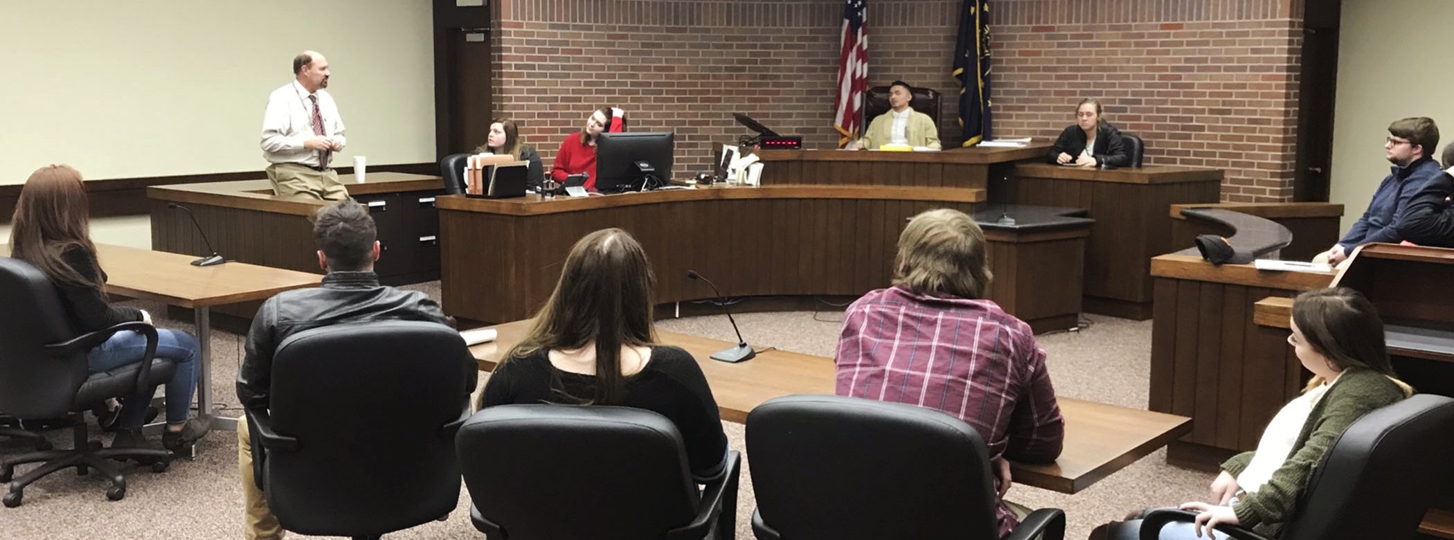 Students participate in a mock trial in the Evansville Courthouse