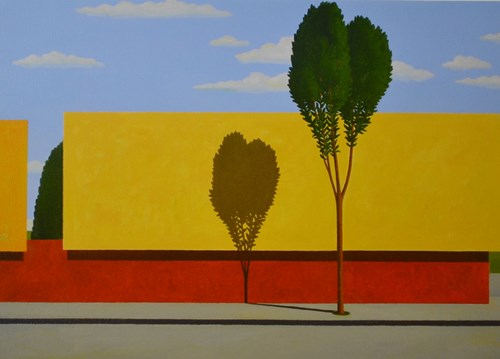 image of a tree infront of a yellow wall