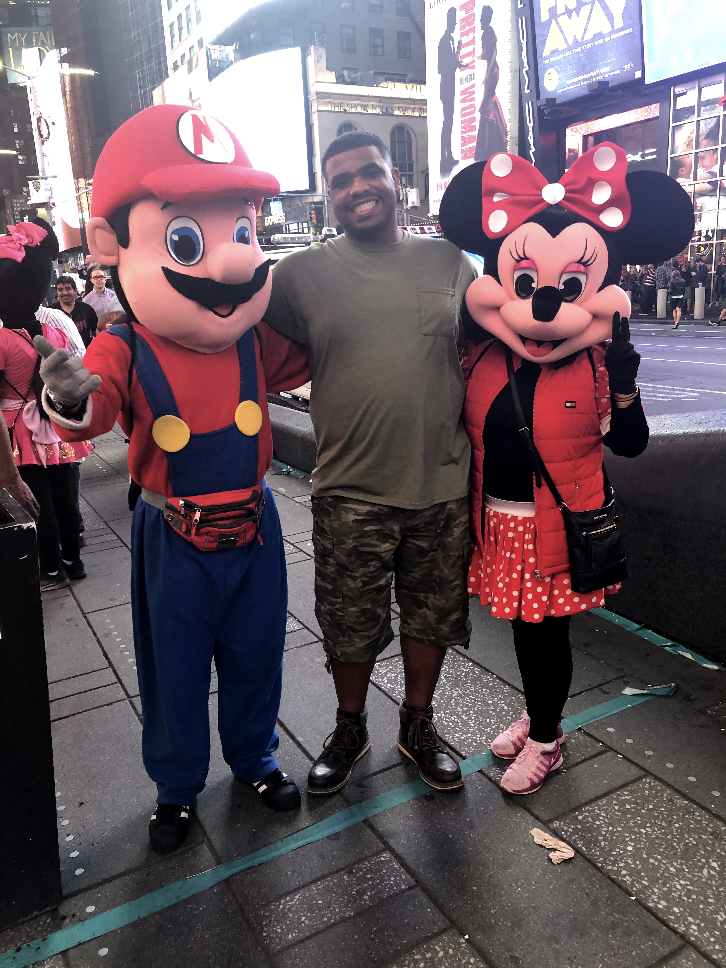 Brandon Carrington with Mario and Minnie Mouse