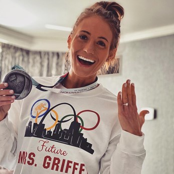 Julia Kohnen shows off her U.S. Olympic Marathon Trials medal and her engagement ring