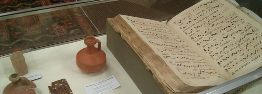 Medieval manuscripts and jars on display
