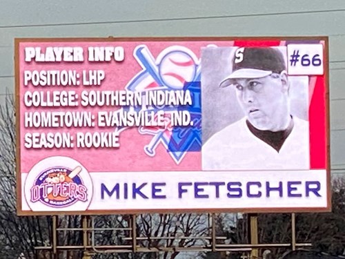 Mike photo on Otters sign