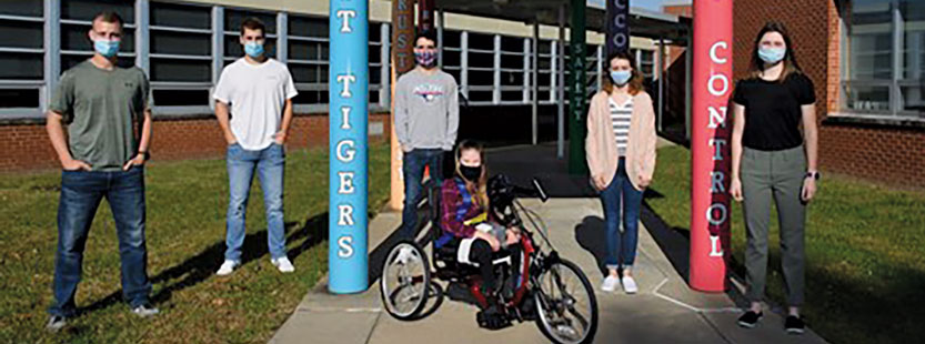 students with adaptive tricycle