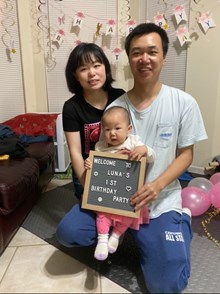 Dr Liu with husband and child