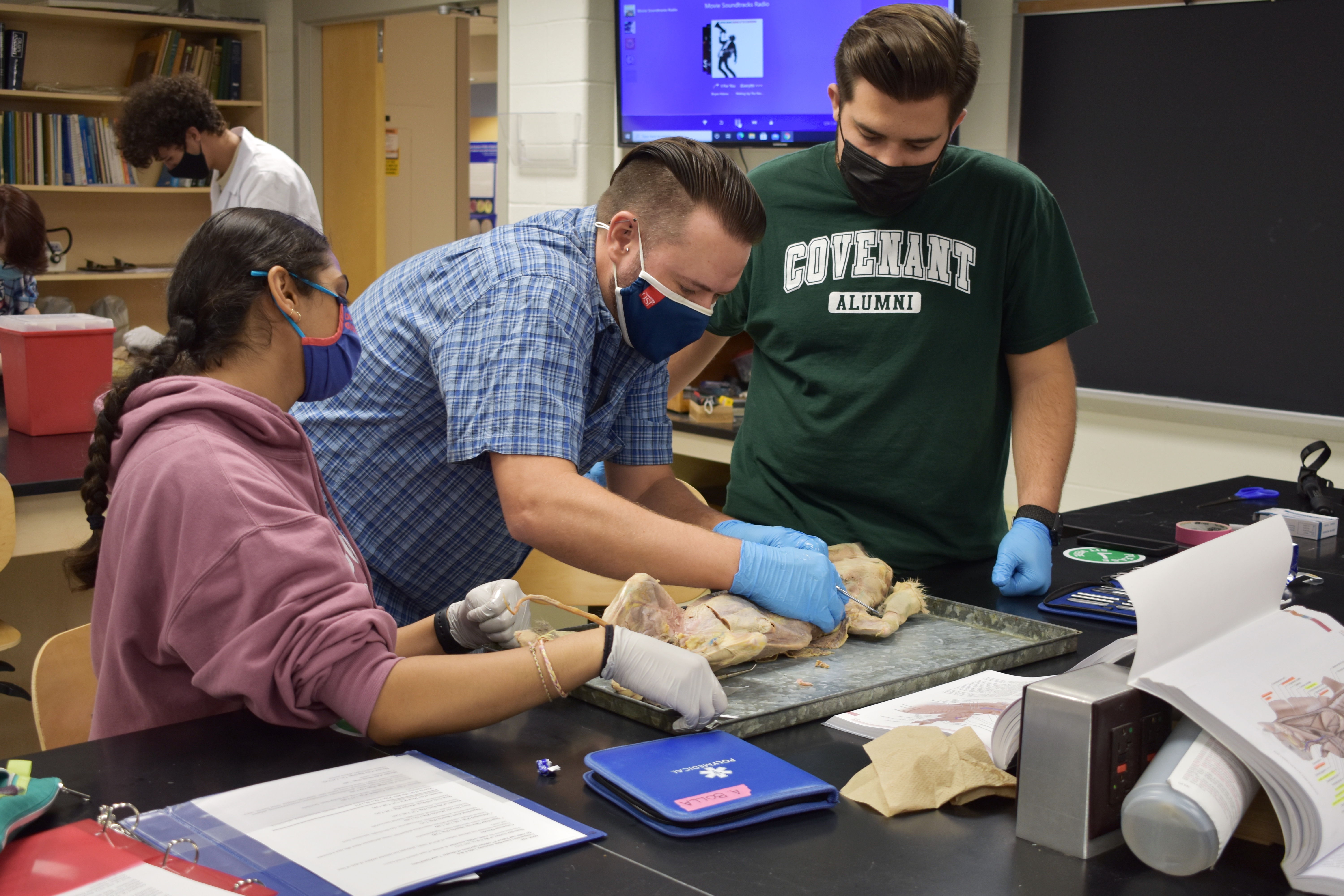 Dr. Mara Helping Students with a Dissection in Comparative Chordate Anatomy