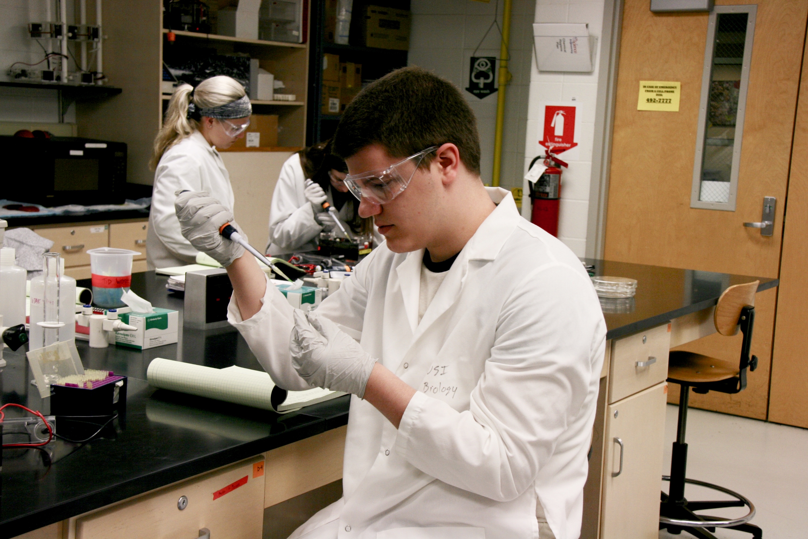 USI Biology student pipettes samples to load a DNA gel.