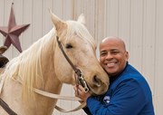 Dr. Ronald Rochon and Jolene, a Palomino America Quarter Horse