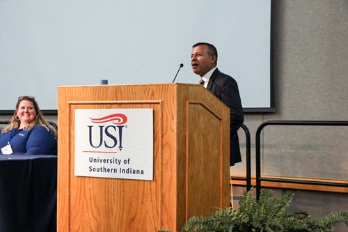 Dr. Mujumdar at podium